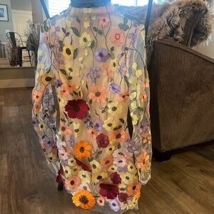 Floral dress with open back.